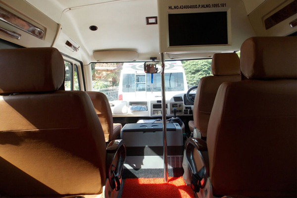 Luxury Tour Bus - Ultra Luxury Coach 1x1 11 Seater Hire - Car Rental Delhi