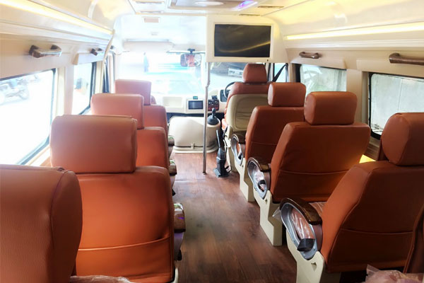 1x1 9 Seater Ultra Luxury Coach With Washroom - Car Rental Delhi