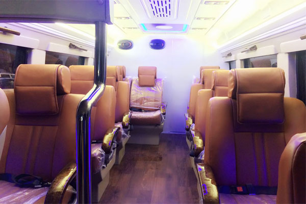 1x1 9 Seater Ultra Luxury Coach With Washroom - Car Rental Delhi