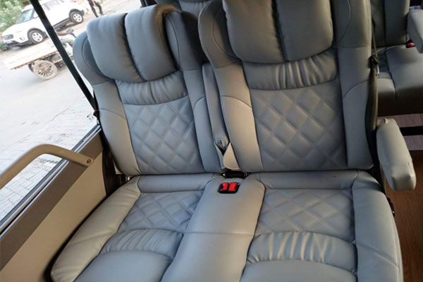 Toyota Coaster Modified Big Seats - 14 Seater - Luxury Imported Van Hire - Car Rental Delhi