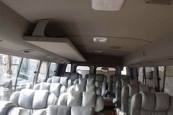 Toyota Coaster Modified Big Seats - 14 Seater - Luxury Imported Van Hire - Car Rental Delhi