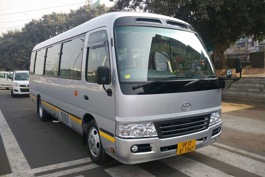 Toyota Coaster Modified Big Seats - 14 Seater - Luxury Imported Van Hire - Car Rental Delhi