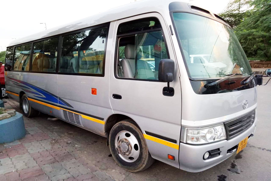 Toyota Coaster Modified Big Seats - 14 Seater - Luxury Imported Van Hire - Car Rental Delhi