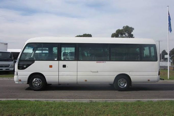 Toyota Coaster Modified Big Seats - 14 Seater - Luxury Imported Van Hire - Car Rental Delhi